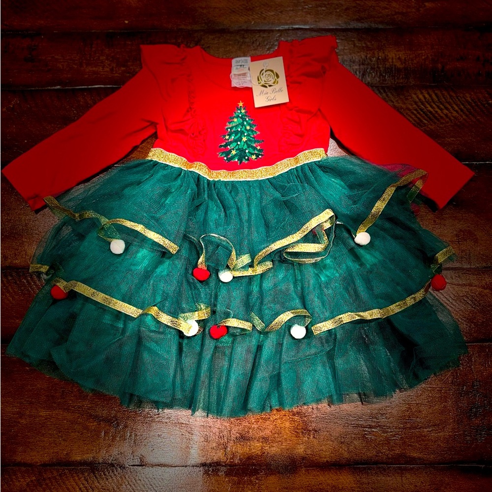 Brand new with tags attached holiday dress size 2T from Mia Belle girls